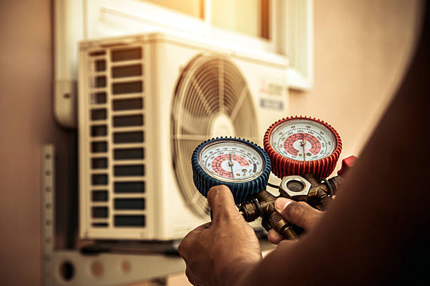 Professional Hvac Maintenance technician working in White Hall, AR